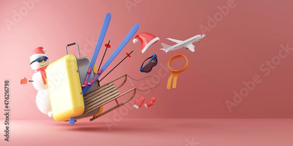 Fototapeta Winter Vacation Concept. Suitcase with Different Accessories for Winter with Snowman on pink studio background