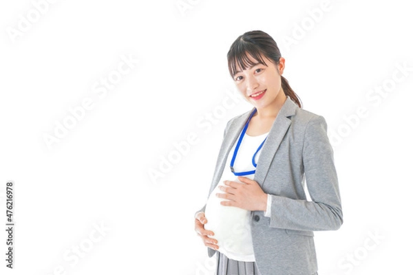 Fototapeta 妊娠中の若いビジネスウーマン