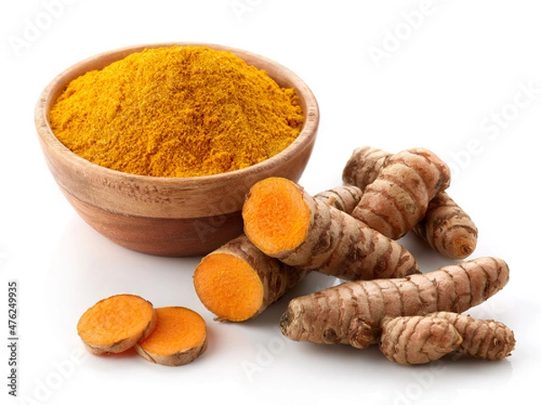 Obraz Bowl of turmeric powder and fresh whole and sliced root