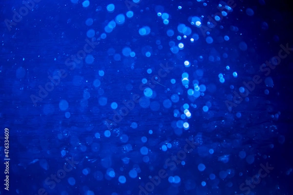 Fototapeta Abstract blur blue sparkle bokeh with black background