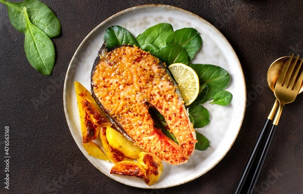 Obraz Salmon steak baked on a plate