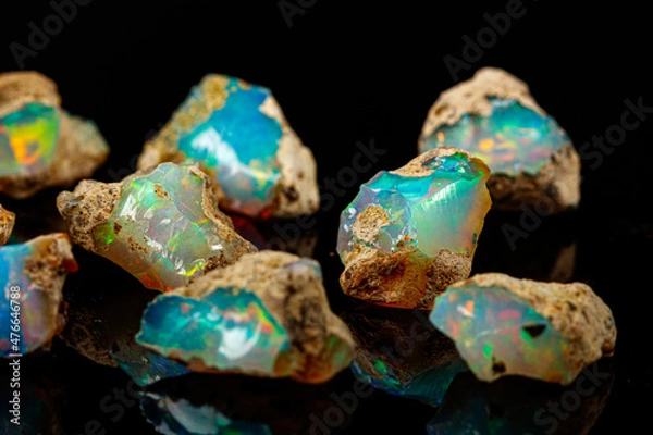 Obraz macro mineral stone rare and beautiful opals on a black background