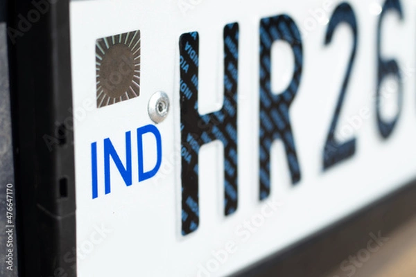 Fototapeta High Security Number Plate With Ashoka Chakra Chromium Hologram IND Sign Is Electronically Linked To Indian Vehicle. HSRP Has Laser Brand Permanent Identification For Protection Against Counterfeiting
