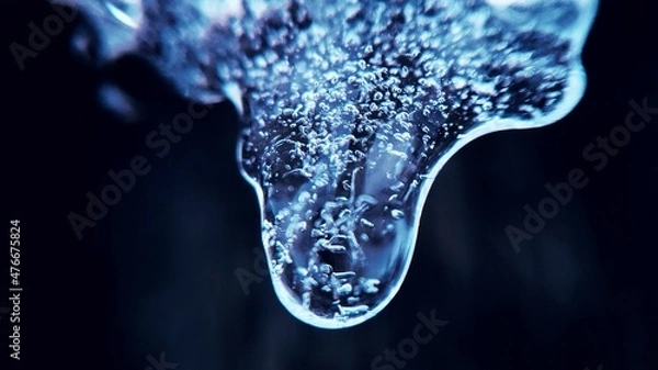 Fototapeta Ice in macro photography on a dark background