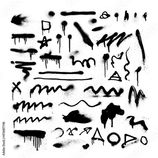 Fototapeta Collection of spray paint splatters. Grunge graffiti on the wall. Traces from a spray of paint.