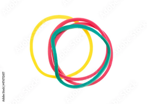 Fototapeta Multi-colored rubber bands isolated on white background.