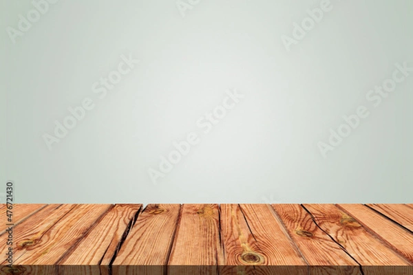 Fototapeta Wooden board empty table in front of gray wall background. Mock up for display of product.