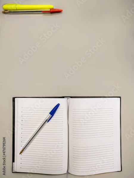 Obraz Open notebook with a pen on it.