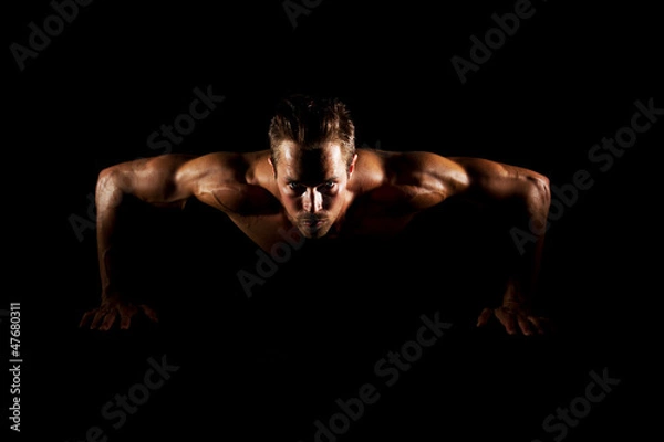 Fototapeta Man doing pushups