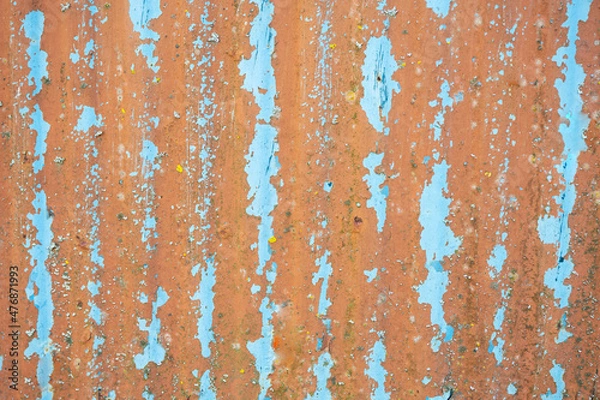 Fototapeta Metal light blue textured. Corroded metal background. Rusted white painted metal wall. Rusty metal background with streaks of rust. Rust stains. The metal surface rusted spots. 
