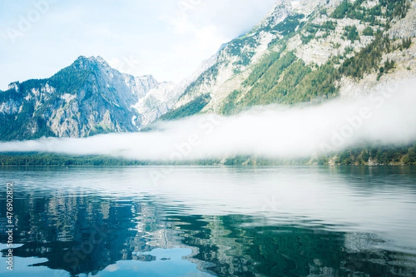 Fototapeta Reflecting Mountains and Fog in the Water of the Koenigssee (Königssee) in the Berchtesgadener Land, Bavaria, Germany