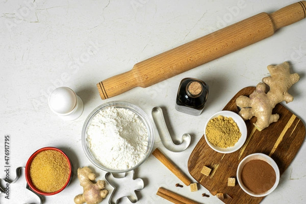 Fototapeta Gingerbread ingredients and accessories for making ginger dough.