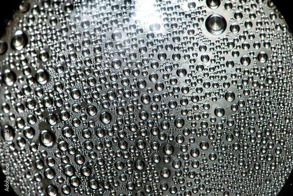 Fototapeta Sparkling drops water of dew on misted wet glass polished smooth surface