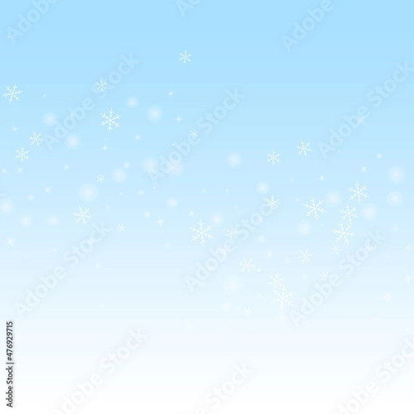 Fototapeta Sparse glowing snow Christmas background. Subtle f