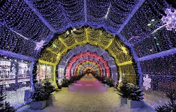 Obraz New year and Xmas street decoration in night illuminated Moscow, LED light tunnel