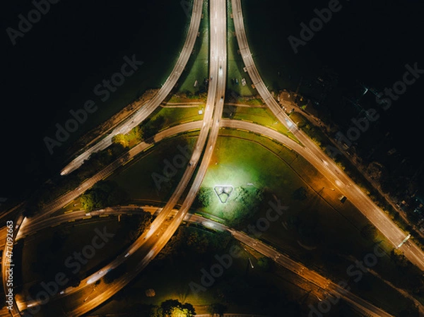 Fototapeta Night top view of the bridge illuminated by road lights