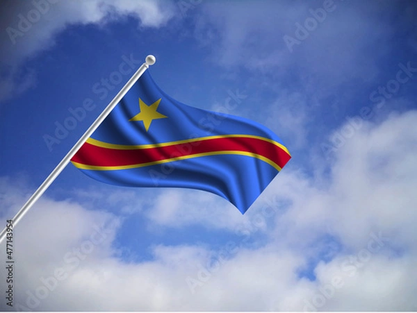 Fototapeta Flag of the Democratic Republic of the Congo on a stick, dark clouds in the background