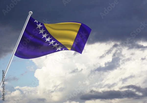 Fototapeta Flag of the Bosnia and Herzegovina on a stick, dark clouds in the background