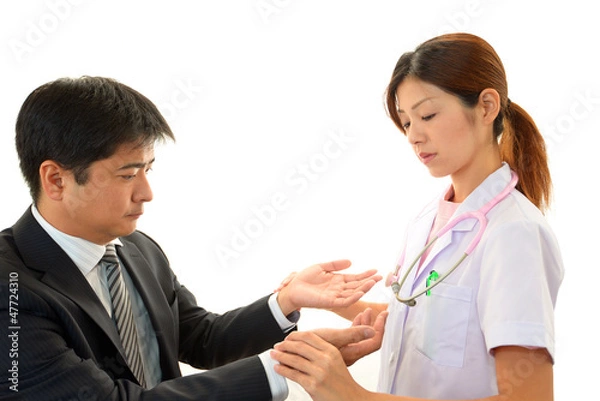 Fototapeta 診療中の女医