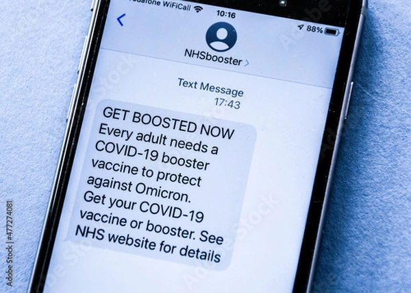 Obraz Text message `Get BOOSTED, COVID-19