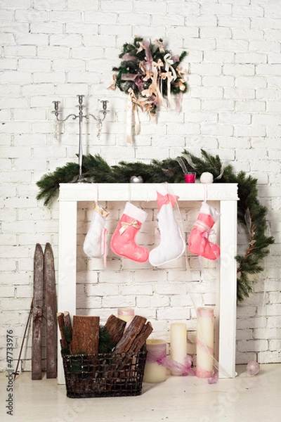 Fototapeta imitation of christmas firewood with socks