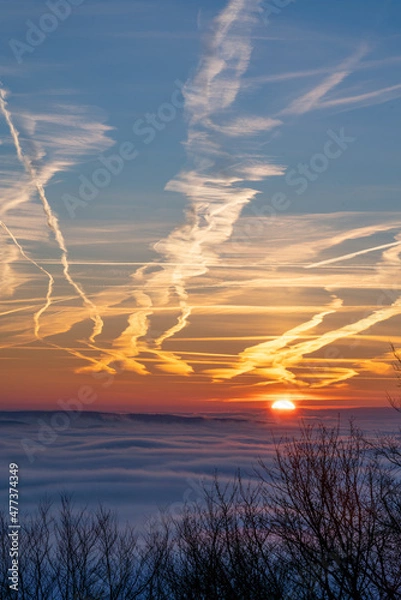 Obraz sunrise over a cloud inversion with vibrant colours