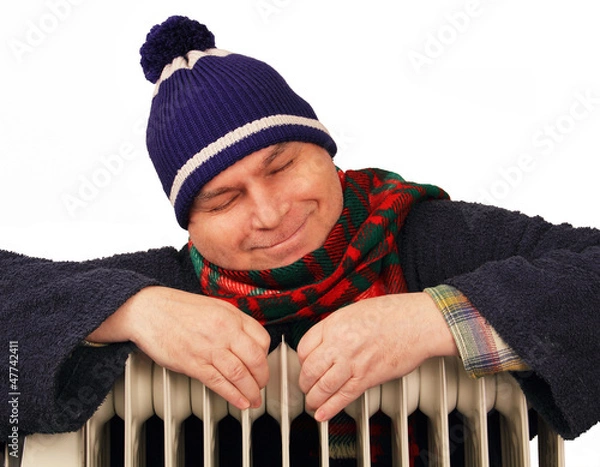Fototapeta man basking in the heater.