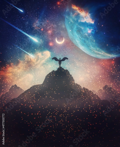 Fototapeta Fantastic creature with angel wings on the top of a mountain against marvelous cosmic sky background. Surreal scene with a celestial messenger or space guardian watching the horizon