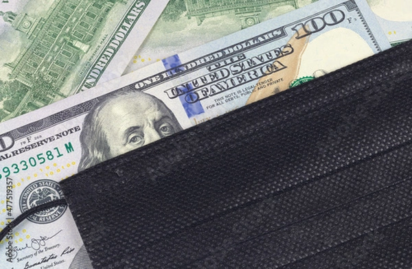 Obraz A face shield on a hundred dollar bill