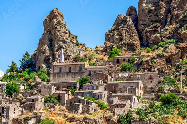 Fototapeta Small village of Pentedattilo, church and ruins of the abandoned village, Greek colony on Mount Calvario, whose form recalls the five fingers. Calabria, Italy