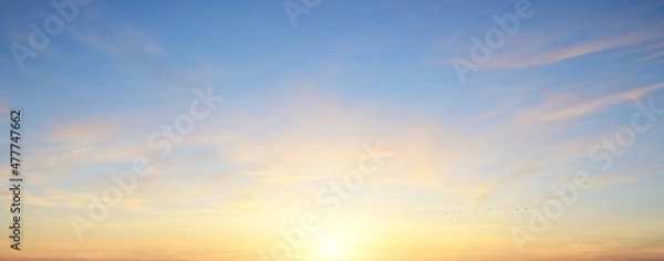 Obraz Clear blue sky. glowing pink and golden cirrus and cumulus clouds after storm, soft sunlight. Dramatic sunset cloudscape. Meteorology, heaven, peace, graphic resources, picturesque panoramic scenery