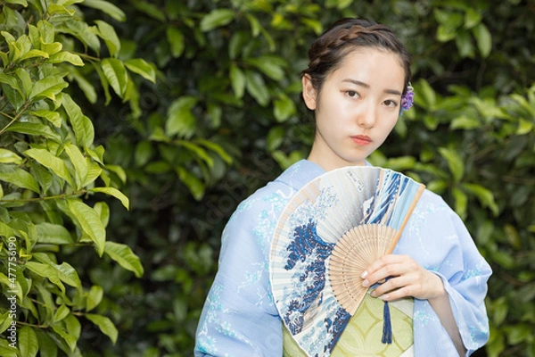 Fototapeta Woman in Japanese traditional fashion