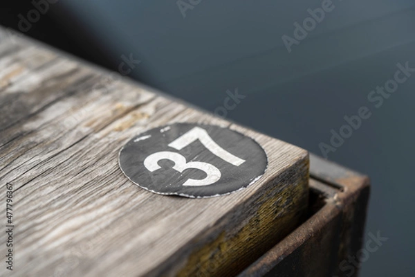 Obraz wooden table with numbers 37