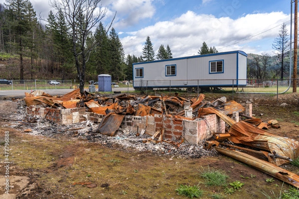 Obraz Burned down house after fire