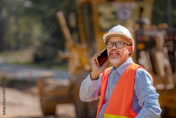 Obraz Surveyor builder Engineer technician  Business Team discuss plan at new construction site.