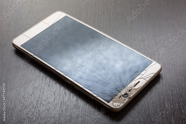 Obraz Smartphone mobile with a broken screen. 
