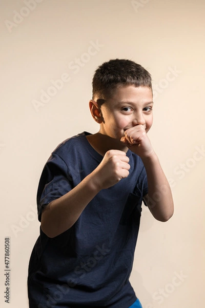Fototapeta boy standing with fists