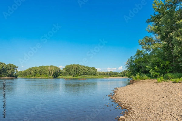 Obraz A river with a pebble bank