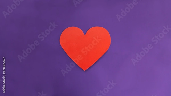 Fototapeta card in the form of a red heart and flowers in a white envelope on a textured blue background. Selective focus. Message and congratulations on Valentine's Day. Valentine's Day greeting cards.
