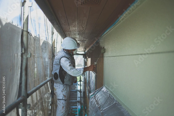 Obraz 塗装職人の塗装の様子