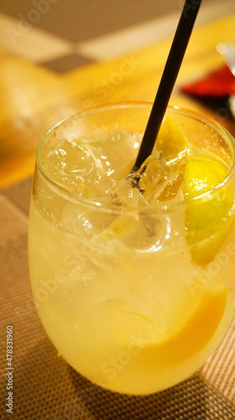 Obraz cocktail with lemon on the table in the cafe in the bar refreshing drink