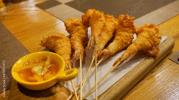 Obraz shrimp in tempura with sauce, food on the table in a cafe in a bar