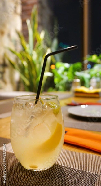 Obraz cocktail with lemon on the table in the cafe in the bar refreshing drink