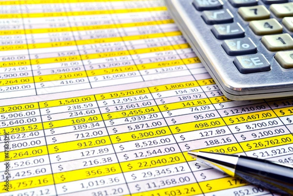 Obraz Financial forms with pen and calculator.