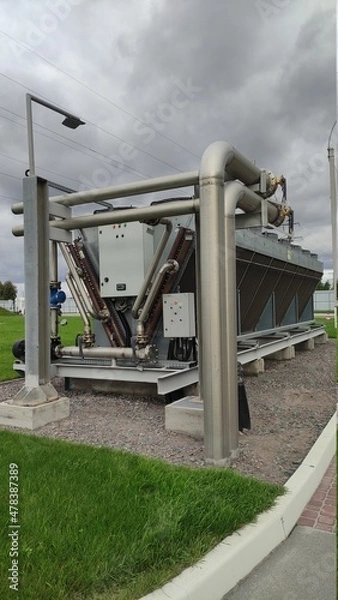 Fototapeta Cooling system for industrial heat exchangers. Industrial fan cooling tower. Adiabatic system.
