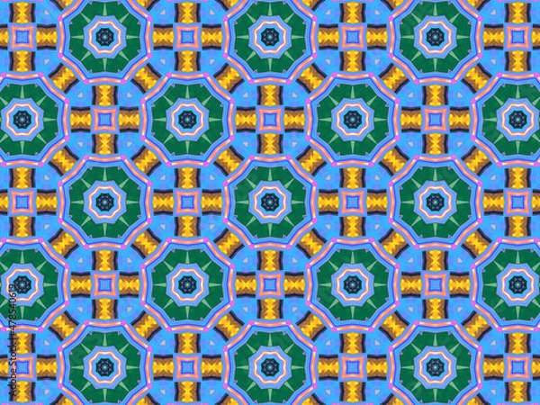 Fototapeta A sophisticated geometric pattern inspired by Middle Eastern and Moroccan ornaments. Elaborate kaleidoscopic surface print in blue, purple and yellow colors for textile design and gift wrapping paper.