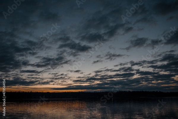 Fototapeta sunset over the lake