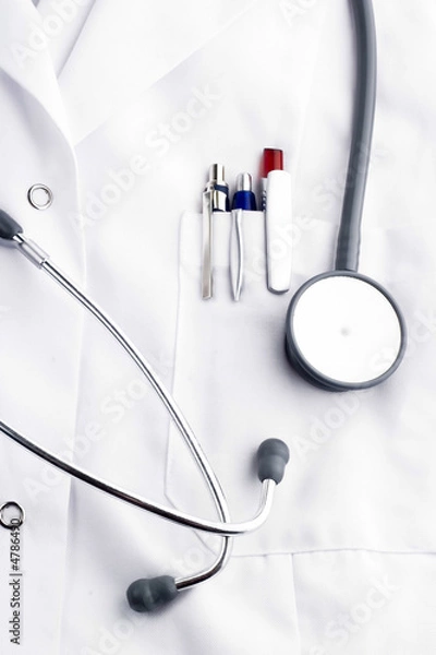 Obraz Medical tools on doctor's lab coat 
