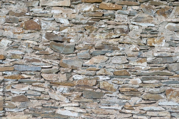 Fototapeta Stone Background with mixed size stone