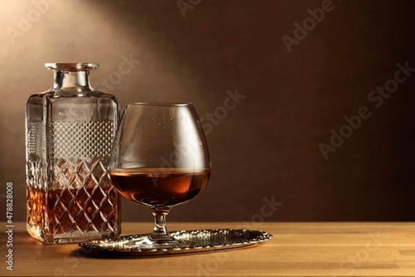 Fototapeta Cognac on an oak table.